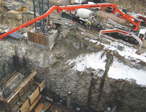 Excavation for the structure required the blasting and removal of 860,000 cu yd of rock and took nearly 18 months to complete. Excavated rock was recycled as backfill within the excavation and as base material for parking areas.