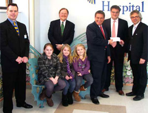 East Rutherford, New Jersey-based Mc Gowan Builders, Inc. donated $15,000 to St. Joseph’s Children Hospital at a ceremony that took place at the hospital’s main campus in Paterson, New Jersey. Seated from left: Patrick Mc Gowan’s daughters Niamh, Emma, and Sarah Mc Gowan. Standing from left: Chris Coyne, Director of Major Gifts, St. Joseph’s Regional Medical Center Foundation; Timothy P. Barr, Vice President for Development, St. Joseph’s Healthcare System, and Executive Director, St. Joseph’s Regional Medical Center Foundation; Patrick J. Mc Gowan, President of Mc Gowan Builders; Martin C. Mc Gowan, Vice President of Mc Gowan Builders; and Michael Lamacchia, MD, Chairman of Pediatrics, St. Joseph’s Children’s Hospital.