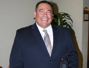 Frank Zamora accepts the 2010 CEA Most Improved Safety Program Award on behalf of Dome Construction Corp.