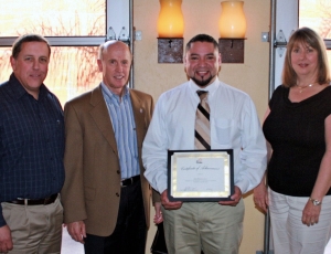 Pictured during scholarship luncheon in Sacramento are, from left, Mike Mencarini, Unger Construction Co.; AGC of California Immediate Past President Bob Christenson; AGC scholarship recipient Jose Buenrostro; and Cathy Skeen, Excel Bonds & Insurance Services and Immediate Past Chair of the AGC Associates Council.