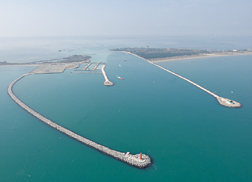 Work at Venice lagoon’s inlets includes marina to double as casting yard at Lido and Malamocco breakwater.