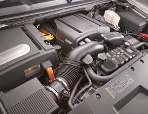 The hybrid system consists of a 6.0L V8, a two-mode transmission and a 300-Volt nickel-metal-hydride battery pack.