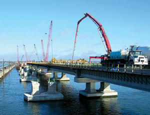 Causeway bridges are being replaced to handle heavy shore traffic.