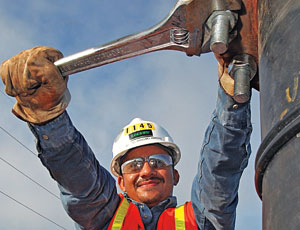 Manuel Anselmo-Arroyo tightens a nut on a powerplant job at Cane Island, Fla. “These people work really hard, day in and out,” says Hollimon, who flew in for a site visit to capture this shot. “I am blessed to get to do it,” she says of her work.