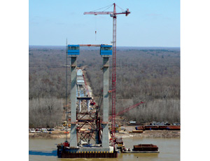 In addition to the central bridge, top, the project includes 12 miles of roadway approaches and seven conventional bridges. Galvanized steel sheaths, (below), will encase the cables at the terminus on both the deck and tower ends.