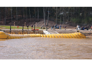  Full-scale trials of a 100-ft-long levee plug at a new test facility in Vicksburg show technology and techniques for rapidly sealing levee breaches are ready for business, but funds are lacking.