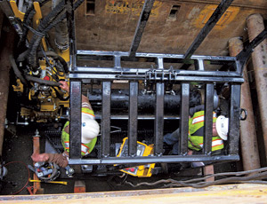 The laser-guided boring system allows crews to precisely place materials and work in tight spaces. 