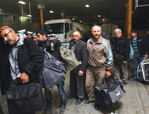 Turkish construction workers evacuating from Libya as projects shut down amid mounting turmoil. 