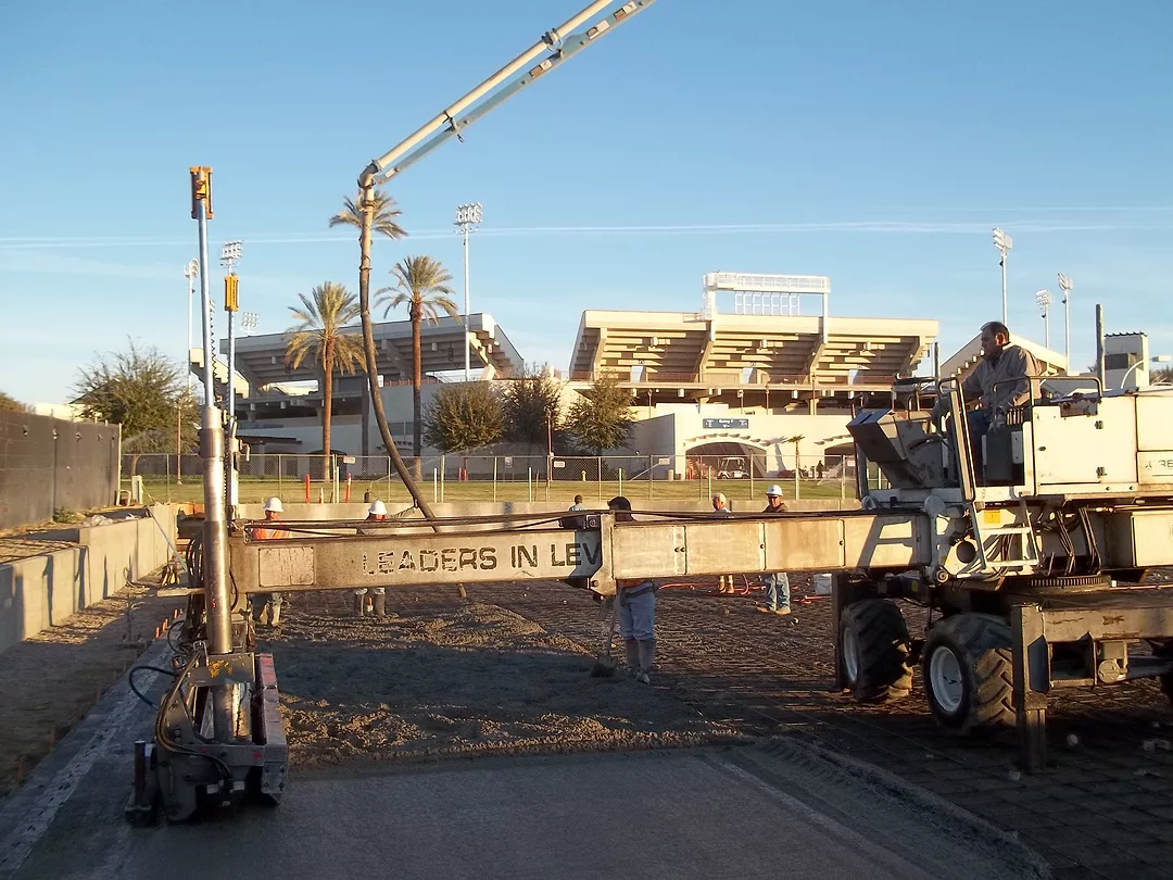 Laser Screed with Stadium in the Background
