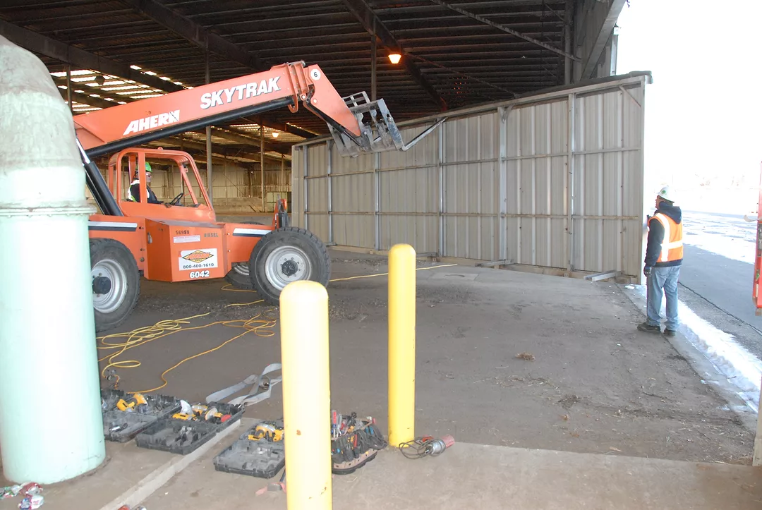 Removing door to compost building