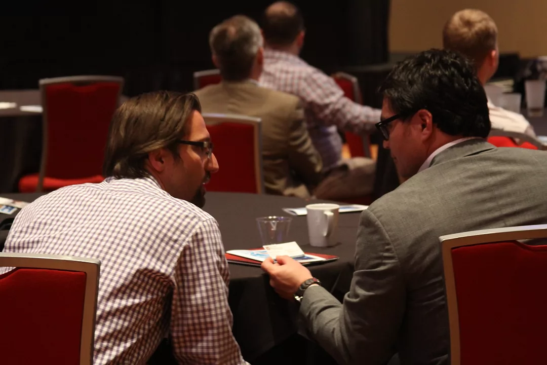 Attendees discuss the latest technology to hit the construction industry