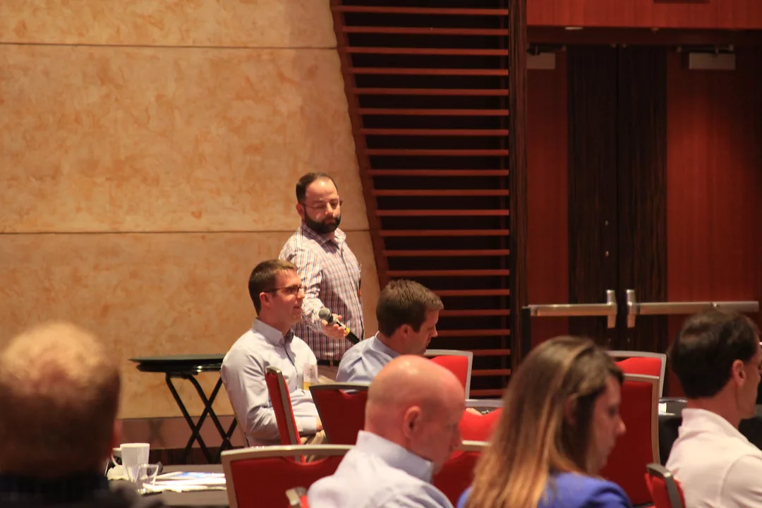 An attendees asks a question during Q&amp;A