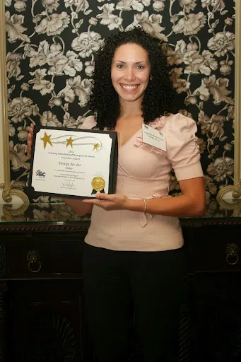 Energy Air HR Coordinator, Olga Montero-Glover Accepts the Company’s Four Star TEAM Award