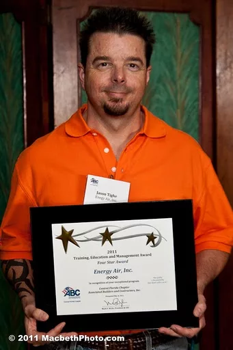 Jason Tithe Accepts TEAM Award at Annual ABC Banquet