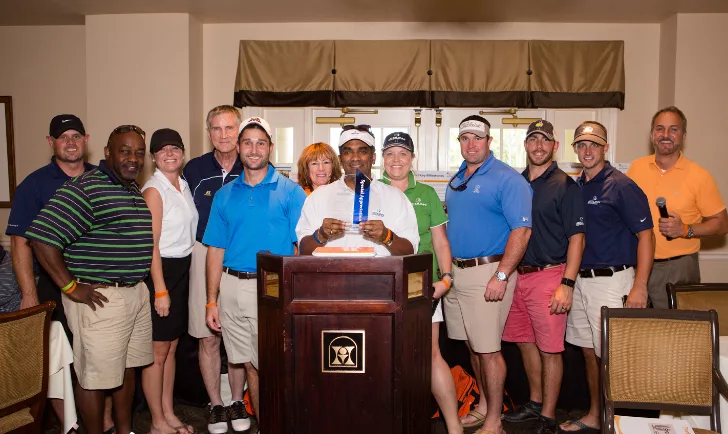 JE Dunn Associates a Formidable Force in 2014 Orange Duffel Bag Golf