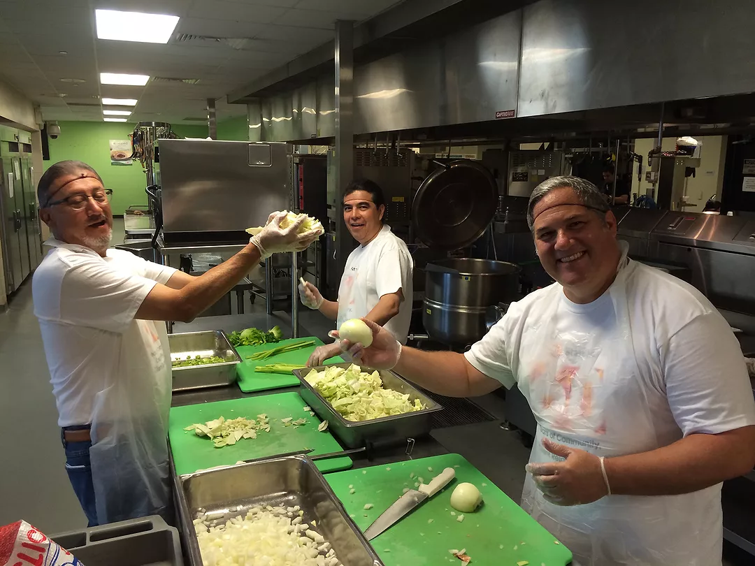 Serving Meals in San Antonio During Stantec in the Community Day