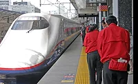 Japanese train cleaners bow as the Tohoku ShInkansen pulls into Tokyo on April 20, 2011. Photo by Tom Sawyer/ENR Japanese train cleaners bow as the Tohoku ShInkansen pulls into Tokyo on April 20, 2011. Photo by Tom Sawyer/ENR