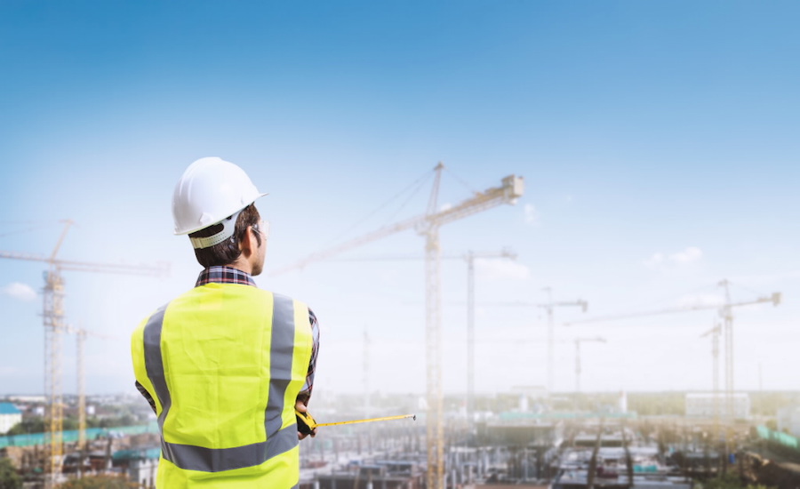 engineer looking at cranes