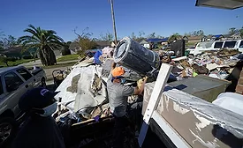 debris from hurricane damaged home