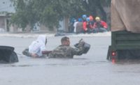 National Guardsman rescues man in floodwater