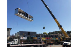 crane lifting a modular piece