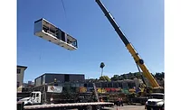 crane lifting a modular piece crane lifting a modular piece