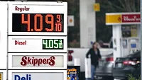 Gas_price_inflation.jpg A gas station sign shows the price of regular gas in red numbers as $4.09.