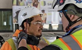 man putting on a hard hat