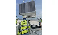 SPC sets one of 78 airlifted HVAC units