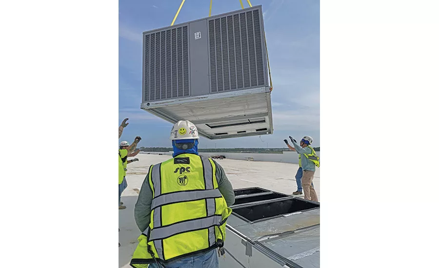SPC sets one of 78 airlifted HVAC units
