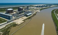 FreeportLNG.jpg An LNG train is shown bordering a brown waterway