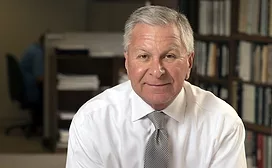 Bob Grubic Standing Over Plans.jpg