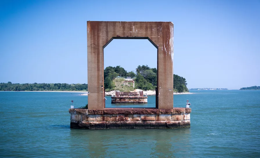 A photo of the Long Island Bridge support piers after the bridge was taken down