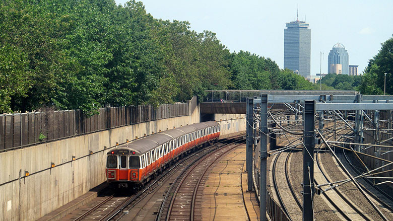 A photo showing an MBTA orange line train in Boston