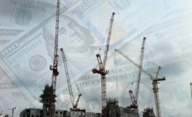 money and construction cranes