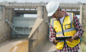 construction worker with a tablet