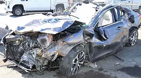 A crash that killed six highway workers in Baltimore left a car totaled