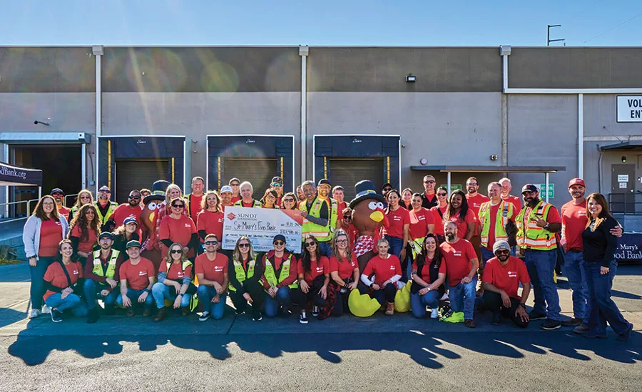 Sundt presenting check to St. Mary's Food Bank