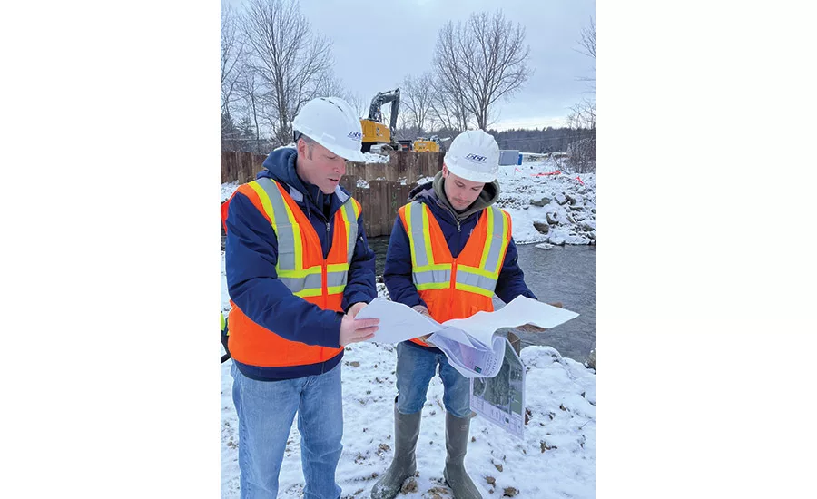 Heath (left)  on Burlington site with project engineer Jeremy Dean