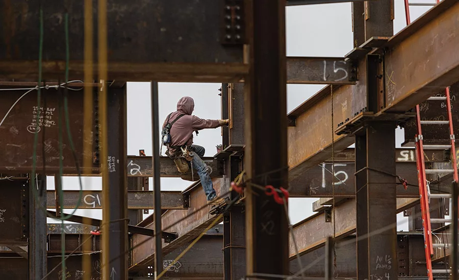 man on a steel girder