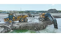 one driver remotely running three ADTs on a jobsite one driver remotely running three ADTs on a jobsite