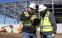 construction men with a tablet construction men with a tablet