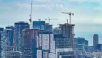 Toronto past skyline with cranes.jpg