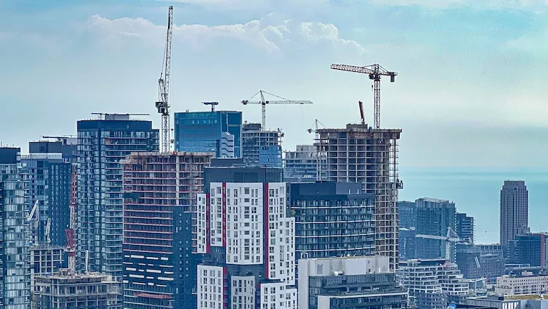 Toronto past skyline with cranes.jpg