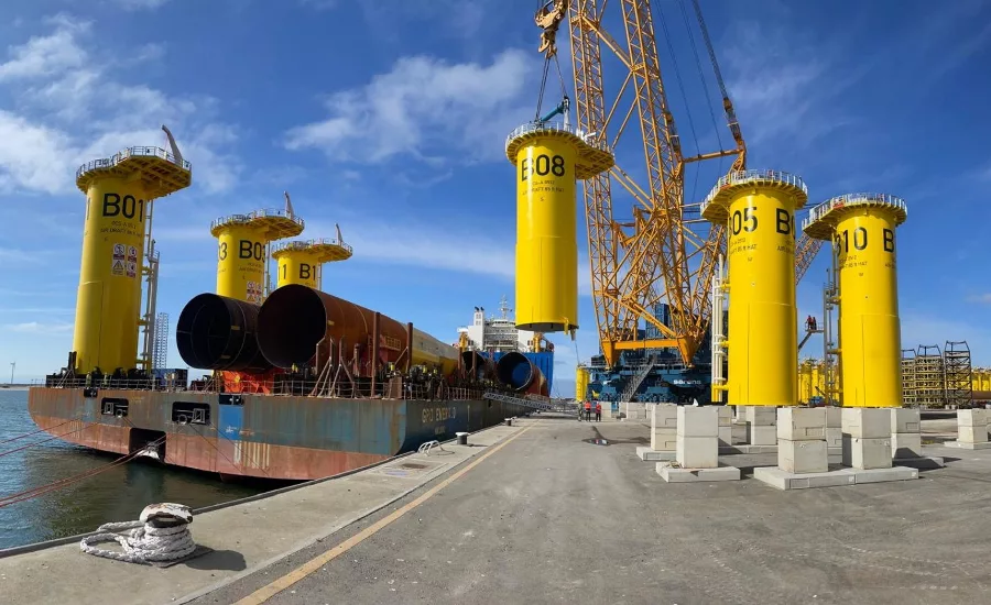 wind turbine equipment is loaded by crane onto a vessel at the South Brooklyn Marine Terminal.jpg
