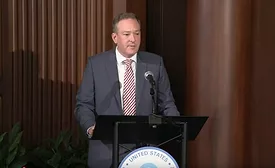 Lee Zeldin speaks at a podium at the EPA headquarters