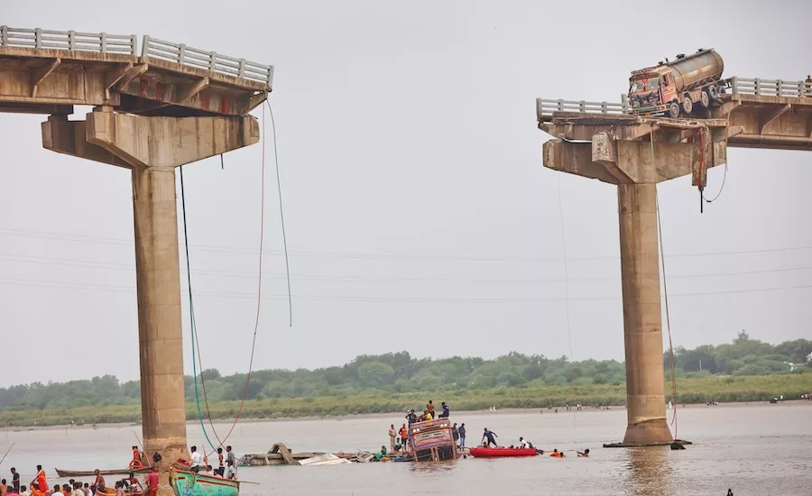 India bridge deck falls into river