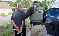 ICE officers perform enforcement