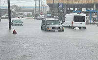 Mass_flood_ENRweb.jpg vehicles caught on a flooded road in Massachusetts