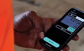 A man using mobile app BuilderFax